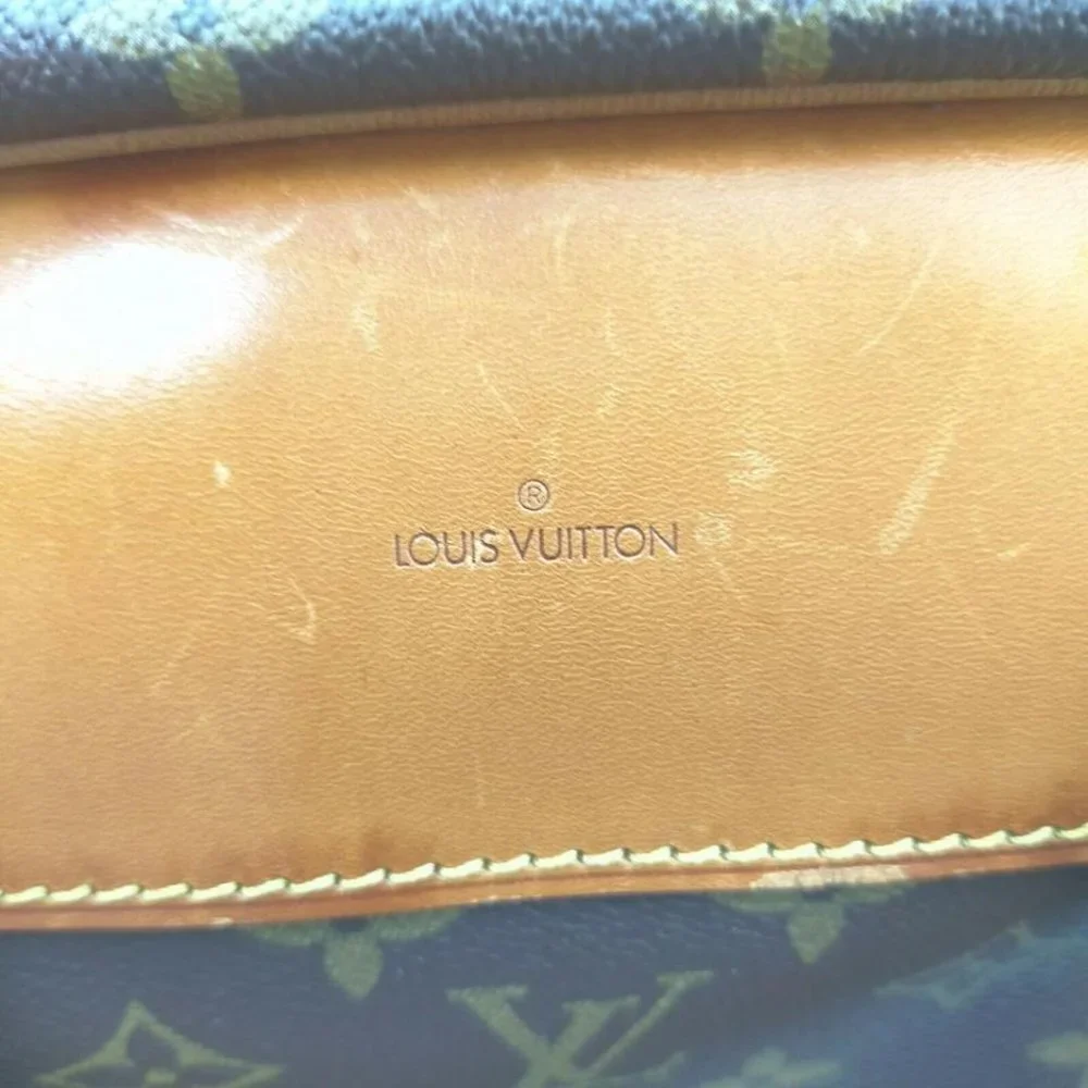 Louis Vuitton Monogram Alize 1 Poche Travel Bag